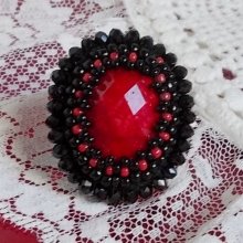 Midnight in Paris ring embroidered with a red faceted cabochon and black round beads